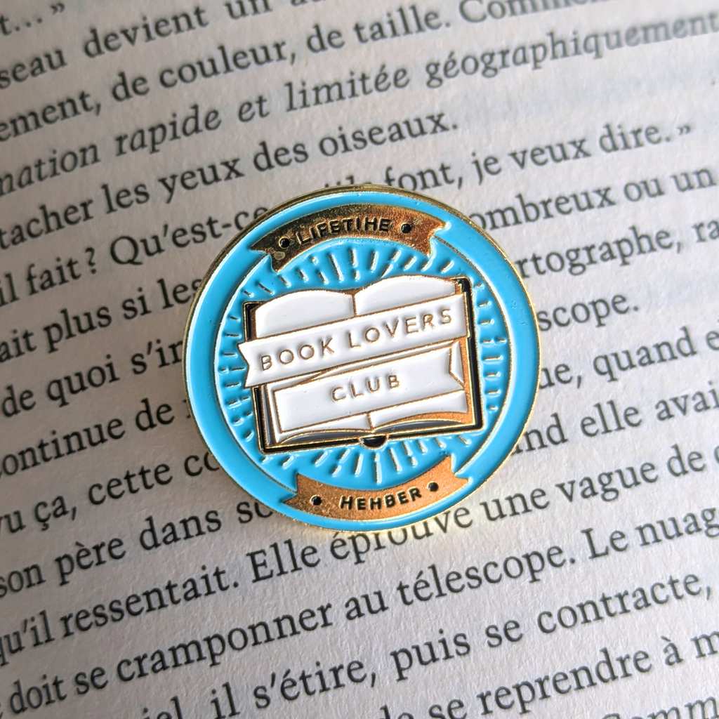 Badge / Pin's métallique Booklovers Club