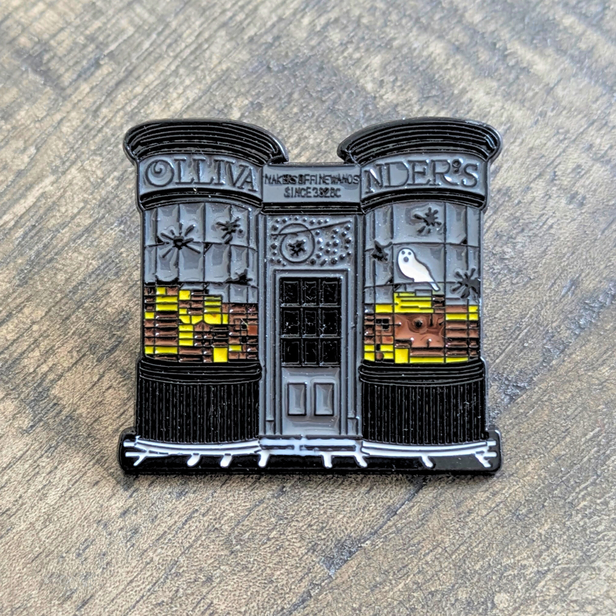 Badge / Pin's métallique Ollivander - série Harry Potter