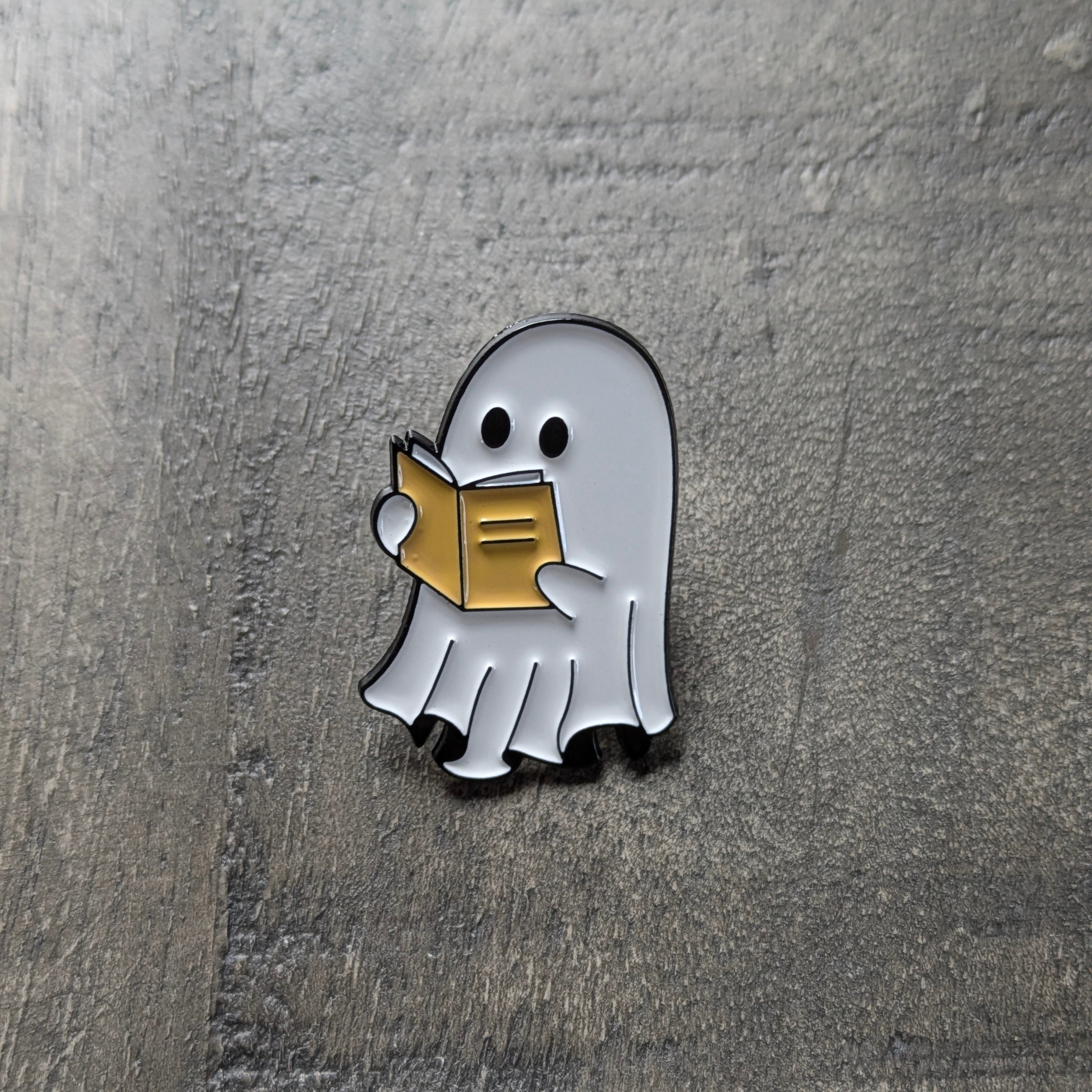 Badge / Pin's métallique Fantôme lecteur